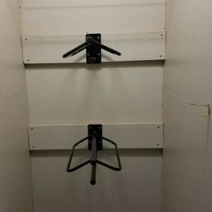 Each closet comes with two saddle racks, a shelf, and multiple hooks for bridles.